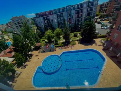 an overhead view of a swimming pool in a city at Bella Apartment - Holiday Complex Rainbow in Sunny Beach