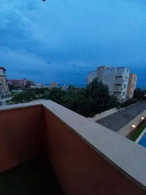 a view from the balcony of a building at Perla 1 apartments in Ravda