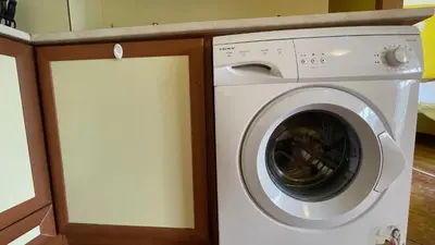 a white washer and dryer in a kitchen at ANITA C 19 Apartment Sunny Beach in Sunny Beach