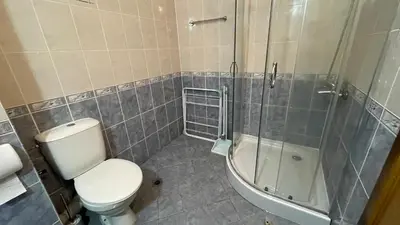 a bathroom with a toilet and a shower and a tub at ANITA C 19 Apartment Sunny Beach in Sunny Beach