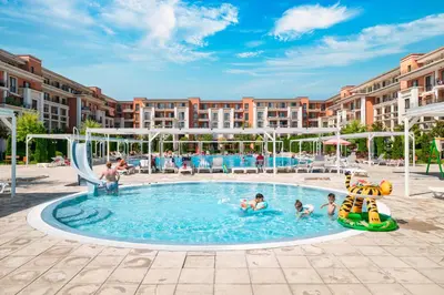 a group of people playing in a pool at a resort at Prestige Mer d'Azur in Sunny Beach