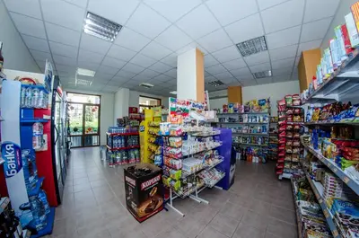 a store aisle with a lot of products in a store at Prestige Mer d'Azur in Sunny Beach