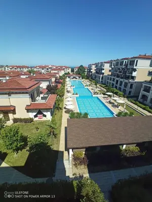an overhead view of a pool at a apartment complex at Апартамент Rose в местност Каваци, Созопол in Sozopol
