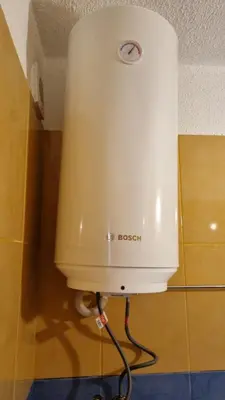 a water heater in the corner of a room at Oasis deluxe apartment by the sea in Ravda