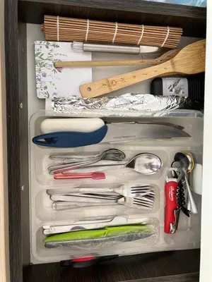 a drawer filled with lots of utensils in a refrigerator at Summer Breeze 515 Studio NO ROMANIA in Sunny Beach