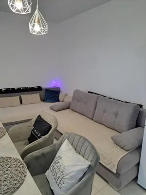 a living room with a couch and chairs at Salvia in Ravda