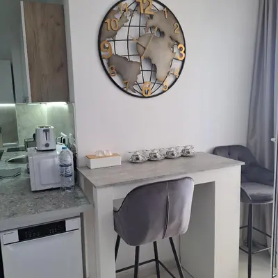 a kitchen with a counter and a plate on the wall at Salvia in Ravda