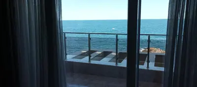 a view of the ocean from a hotel room window at Swan Bay complex in Chernomorets