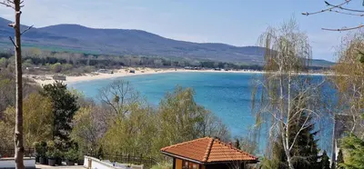 a view of a beach with a gazebo at Eve Santa Marina Studios - sea, pools, relax in Sozopol