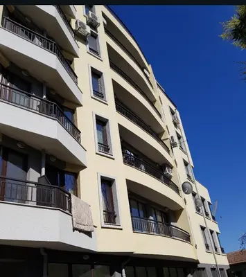 a tall building with balconies on the side of it at Studio Rêve in Burgas City