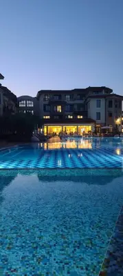 a large pool of water in front of a building at LOVE apartment in Burgas City