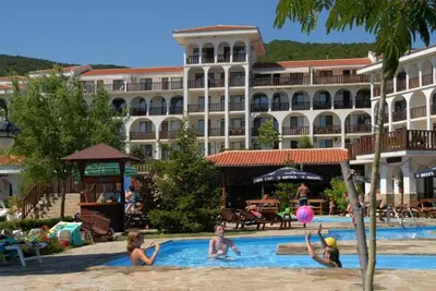 a group of people playing in the swimming pool at a hotel at Sveti Vlas Kambani Bells 3 Ap 7a in Sveti Vlas