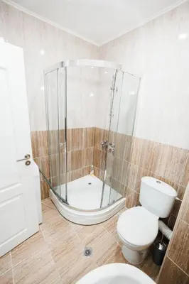 a bathroom with a glass shower and a toilet at LifeStyle 6 in Sunny Beach