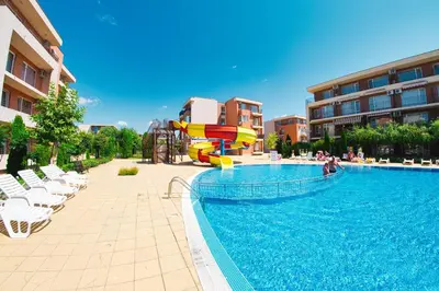 a swimming pool with a slide and a water park at Nessebar and Holiday Fort Apartments in Sunny Beach