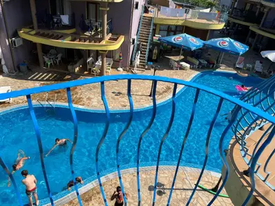 a group of people swimming in a swimming pool at Camping Gradina Garden Beach b33 in Chernomorets