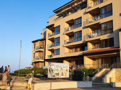 a large apartment building with a mural in front of it at Urlaub - Obzor Beach Resort A109 in Obzor
