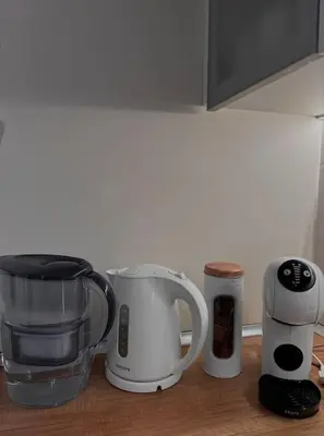 a group of appliances sitting on a kitchen counter at New luxury furnished apartment - beach, Varna center & fast Wi-FI in Varna City