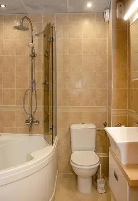 a bathroom with a toilet and a tub and a sink at Cozy 1BD Apartment with Free Parking in the Area by Flat Mаnager in Varna City