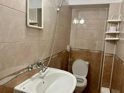 a bathroom with a sink and a toilet at Sozopol Old Town - Apartment 3 in Sozopol
