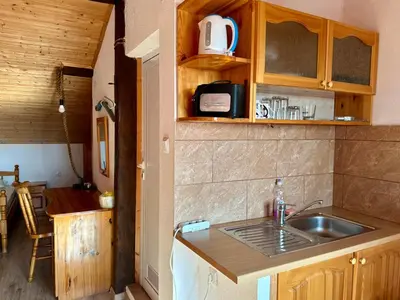 a kitchen with a sink and a counter top at Sozopol Old Town - Studio 5 Attic in Sozopol
