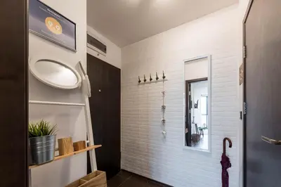 a bathroom with a sink and a mirror at Студио в близост до Община Варна in Varna City