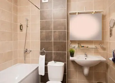 a bathroom with a toilet and a sink and a tub at Sunrise Splendid in Obzor