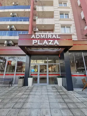 a building with a sign that reads animal plaza at Admiral Plaza Sunrise Apartments C13 in Sunny Beach