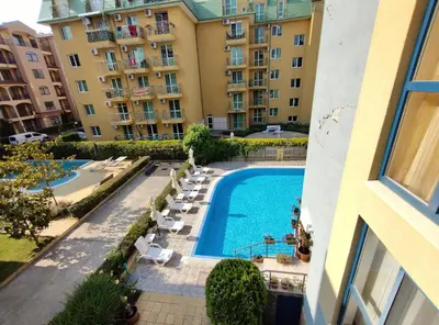 an overhead view of a swimming pool in a building at Ваканционно студио Аквария in Sunny Beach