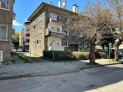 an empty street in front of a building at Niya Apartment Bourgas in Burgas City