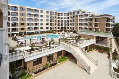 an aerial view of a building with a swimming pool at Purple Rose Apartment Valencia Gardens in Nesebar