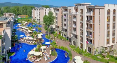 an aerial view of a resort with a river and buildings at Deluxe Appartement in Cascadas Resort Sunny Beach in Sunny Beach