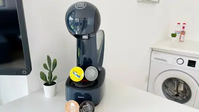 a blender sitting on a counter next to a washing machine at ETARA 2, Sveti Vlas - APARTELLO⊛com in Sunny Beach