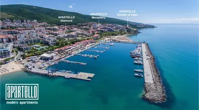 an aerial view of a harbor with boats in the water at APARTELLO⊛com DIAMOND - private apartments near Marina Dinevi in Sveti Vlas in Sveti Vlas