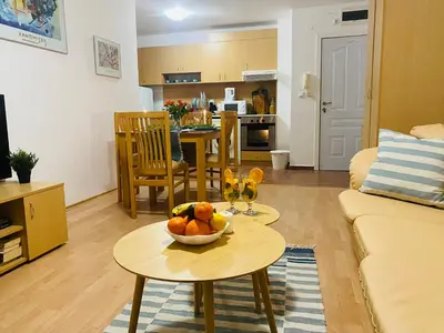 a living room with a bowl of fruit on a table at Apartment in Sveti Vlas in Sveti Vlas