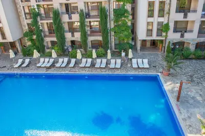 an overhead view of a swimming pool in front of a building at Cascadas Holiday Apartments in Sunny Beach