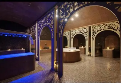 a room with a tub in the middle of a building at ROYAL BEACH & APARTAMENT in Sunny Beach