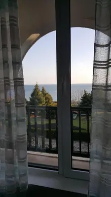a view of the ocean from a window at Monastery Apartment 14, St. Vlas in Sveti Vlas