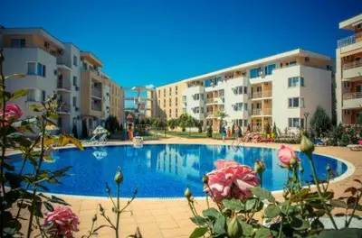 a large swimming pool in front of some buildings at Cosy, Studio Apartment At Nesebar Fort Club in Sunny Beach