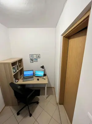 an office with a desk with two laptops on it at Large apartment in Sunny Beach in Sunny Beach