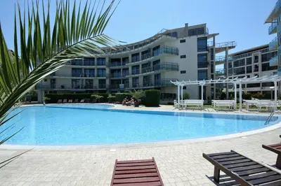 a large swimming pool in front of a building at Large apartment in Sunny Beach in Sunny Beach