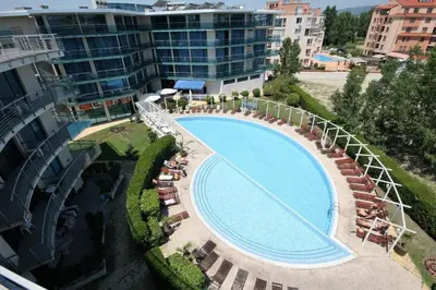 an overhead view of a swimming pool in front of a building at Large apartment in Sunny Beach in Sunny Beach
