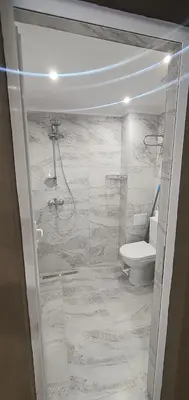 a bathroom with a shower and a toilet at KALI GUEST ROOM in Varna City