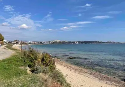 a view of a beach with the ocean at 1 Bed Apt, Close To Ravda Beach in Ravda
