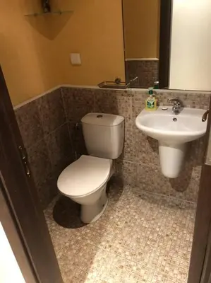 a bathroom with a toilet and a sink at 2 Bed, Royal Beach Barcelo Hotel in Sunny Beach