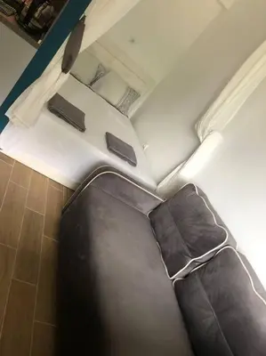a couch in the middle of a train car at Luxurious Studio Apt,4* Cascadas in Sunny Beach