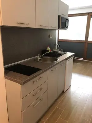 a kitchen with a sink and a counter top at Luxurious Studio Apt,4* Cascadas in Sunny Beach