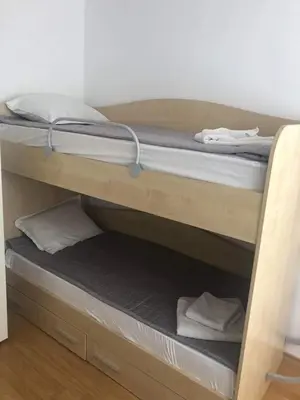 a couple of bunk beds in a room at Spacious, 2 Bed Apt, Fort Orchid in Sunny Beach