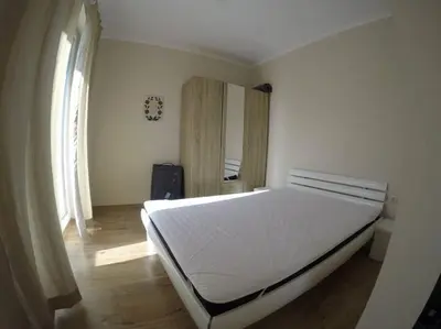 a bedroom with a white bed in a room at Plush, 1 Bed Apt, Dawn Park D in Sunny Beach