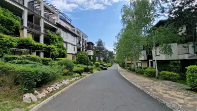 an empty street in a city with buildings at Nevena Summer Apartment by Santa Marina Sozopol in Sozopol