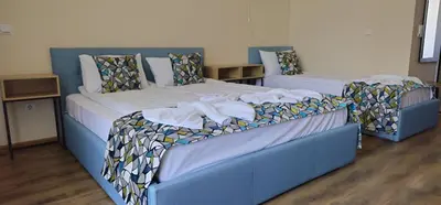 two beds in a hotel room at Royal Marina Beach in Chernomorets